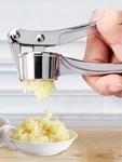 Garlic Press Crusher Ginger Mincer Stainless Steel Hand Kitchen Tool. Fixed Price $14.00.