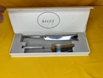 Ricci Argentieri Cake Knife And Server Set. Fixed Price $89.99.