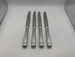 Set 4 Christofle Acier Stainless Steel Osiris Dinner Knives. Fixed Price $151.99.