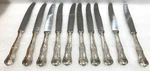 Ten Super Inox Dinner Knives Silver Plated Handles. Fixed Price $22.00.