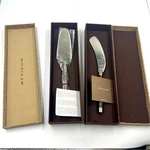 Set Of 2 Nib Atticus Morgan Stainless Leopard Wood Handle Knife Cake Server. Fixed Price $150.00.