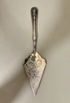 Princess House Silver Plate Cake Server Italy #319 Engraved Pattern. Fixed Price $6.99.