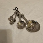 Ganz Fleur Lis Measuring Spoons With Leather Holder. Set Of 4. Not Used.. Fixed Price $17.00.