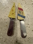 Vintage Concepts 4 Stainless Cheese Spreader Set Swiss & Brie Novelty Knives. Fixed Price $15.00.