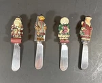 (4) Boston Warehouse Christmas Cheese Knives Spreaders Snowman Santa Bear. Fixed Price $6.00.