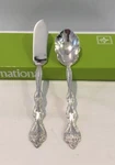 Vtg Nib Silverplate 2PC Serving Set International Co. #022810 Knife Spoon. Fixed Price $50.99.