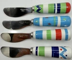 Tag Stainless Steel Cheese Spreader Knives. Fixed Price $15.99.