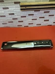 Zwilling Pro 7-INCH Hollow Edge Santoku Knife. Fixed Price $89.99.
