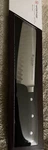 Wusthof Classic Ikon Hollow Edge Santoku 7 Inch Knife - Black. Fixed Price $89.00.