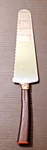 Amway Cake Knife Bakelite Handle. Fixed Price $14.99.