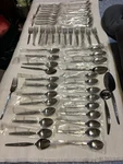 63 Pieces Eldan ELD5 Stainless Rose Pattern Handles New. Fixed Price $15.00.