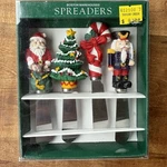 Vintage Christmas Spreaders Stainless Steel Blade Set Of Boston Warehouse 1994. Fixed Price $11.00.