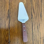 Winco Stainless Steel Rosewood Handle Cake Server Spatula #249. Fixed Price $13.77.