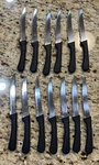 (13) Winco K-60P #249 Steak Knives W/5-INCH Blade & Black Plastic Handle Lot. Fixed Price $13.99.
