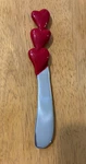 Mariposa Red Heart Spreader Cheese Knife Recycled Aluminum Enamel W/sleeve. Fixed Price $20.00.