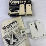 The Sharpery Chantry Pull Thru Knife Sharpener Handheld White With Instructions. Fixed Price $32.99.