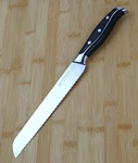 Brodark Steel-king Series 8" Bread Knife, Stainless Blade, Full-tang Handle. Fixed Price $18.00.