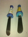 Two Boston Warehouse Cheese Spreaders Party Hat Themed. Fixed Price $9.99.