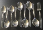 9 Vintage Mcm Silco Stainless Steel INS125 Flatware Spoon Fork Lot Set Waves. Fixed Price $17.49.
