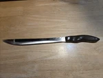 Vintage Cutco 1023 Serrated Carving Knife Brown Handle Usa. Fixed Price $20.40.