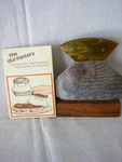 Alaskan Ulu Knife-dog Sled Team-engraved Blade-wooden Stand. Fixed Price $7.49.