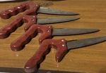 Set Of 4 Dci Steak Saw Knives Red Ergonomic Handle Serrated Blades 2010. Fixed Price $14.95.
