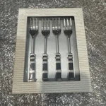 Set Of Four Cocktail Forks From Crate & Barrel. Fixed Price $20.00.