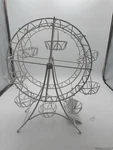 Apropos Home Collection Ferris Wheel Cup Holder For Displaying Cakes. Fixed Price $34.99.