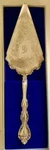 Vintage International Silver Co. Ornate Cake/pie Server. 1990 S. #104-081. Fixed Price $38.00.