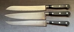 J Henckels International Spain Chefs/carving/ 8" Serrated Bread Slicing Knives. Fixed Price $27.50.