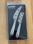 New Metalla Cheese Knives Set Of 2 Stainless Steel Knife. Fixed Price $22.00.