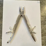 Winco Stainless Steel Multi-tool Plier, Knife, Serrated Bottle Opener. Fixed Price $9.99.