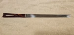 Stanhome Ginsu Serrated Carving Knife 14.5 Inch Stainless Forked Blade Bakelite. Fixed Price $10.95.