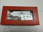 Oleg Cassini Crystal & Stainless Steel Cheese Knife And Fork Set, Silver, Glossy. Fixed Price $19.99.