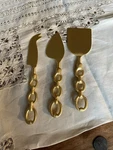 Creative Co-op Gold Cheese Server Knives With Chain Shaped Handles, 3PC Gift Set. Fixed Price $24.95.