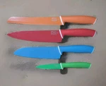 4 Pc Chicago Cultery Set Chef's Knife, Santoku, Bread, Paring Colors 1E13X. Fixed Price $21.00.