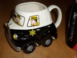 Dick Tracy Police Car, 3-D & Rolling Wheels, Ceramic Coffee CUP,1990 Yr.. Fixed Price $25.00.