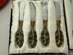Bombay Leaf Handle Cheese Spreaders Set Of 8 Stainless Steel Resin Decorative. Fixed Price $80.00.