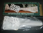 New International Company #99110703 Silverplated Asparagus Server (SU146). Fixed Price $17.99.