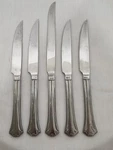5 Pc Set Reed & Barton Lyndon Stainless, 4 Steak Knives, 1 Carving Knife. Fixed Price $29.00.