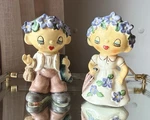 Rare Lipper & Mann Flower Child Spring Boy Girl Salt Pepper Shaker Set Kitschy. Fixed Price $525.00.