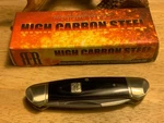 Rough Ryder Black G10 Titanium Coated High Carbon Canoe 3 5/8" RR1571. Fixed Price $21.98.