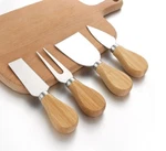 4PC Cheese Knife Set Stainless Steel Cutters Wooden Handles Serving Tools. Fixed Price $9.99.