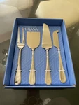 Mikasa Bravo Four Piece Cheese Set. Stainless Steel.. Fixed Price $25.00.