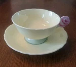 Paragon Rose Handle Tea Cup Saucer Set Pastel Yellow Double Warrant. Fixed Price $250.00.