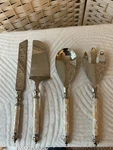Godinger 4 Piece Mother-of-pearl Handles Serving Set. Fixed Price $36.99.