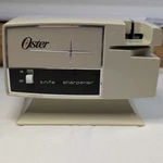 Vintage Oster Knife Sharpener # 511-06B Used Tested Good. Fixed Price $13.49.