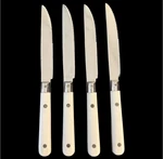 Ginkgo Prix White Handle Serrated Dinner Steak Knives Set Of 4 Vintage. Fixed Price $19.00.
