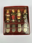 Vintage Boston Warehouse Christmas Set Of 4 Holiday Folk Spreaders Knives. Fixed Price $14.24.