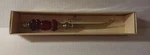 Cypress Home Cheese Knife Mango Moon Collection Red 9". Fixed Price $23.00.